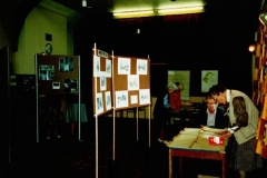 11 October 1986: Exhibition: Bartons in the 1920s. Anne Martin and Mary Page behind the screens. Centre: Ruth Kirby and Madge Byford. Right: Cynthia Laws and 'Pip' Phipps.