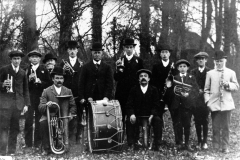 1910 Middle Barton Mission Band. Back: Fred Reeves, Will Stewart, Solomon Stewart (from Canada), Jim Castle, Alfred Reeves (with drum), Ken Castle, Charlie Hawtin, Bert Stewart, Horace Castle, Teddy Matthews. Seated: Archie Reeves, George Kirby.