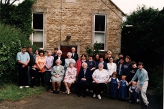 2000 Millennium photograph, (left to right, front row) Mrs Hilary Bassett, Mrs Ethel Evans, Mrs Brown, Deanna Gardner, Emily, Rosie and James Caldwell, Louise Caldwell.