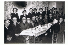 1940s Red Cross Tea Party. Joan Fleming and Mary Osment are standing left and third left. Others there were Rose West, Rene Stockford, James Canty and Pop Hopes.