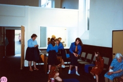 July 1987 Guides and Brownies Open Meeting. Peggy Gregory by the door.