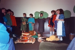 12 March 1992 Guides Pantomine. L to R: Alexis Thomson, Nicky Burwell, Hester Gathony, Lucy Waring, Louise Phipps, Hannah Schneider, Sarah Parrett (brown dress) Tricia Houston, Eleanor Norgrove, Emma Jones.