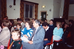 June 1988 Cub/Scout AGM. Front: Bill Edbury (back view), scout, Marianne? Peedell, Malcolm? Peedell, Geoff Divey, ?. Against window: David Monk, David Robey.