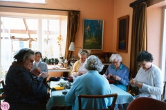 23 April 1987 Sewing squares for Oxfam blankets. Foreground: Beryl Wyatt (back view). Round the table L to R: Bubbles Pratley, Dorothy Smith, Hilary Bassett, Margaret Hazell and Marion Pettengell.