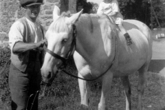 1920s Near the Fox Inn with Roy? on a pony.
