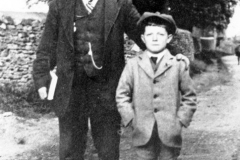 c. 1925 George Kirby and his son, George, on their way to chapel.