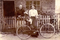 Aubrey West (on bicycle) with mother and grandmother.