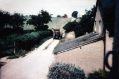 1970s. Track and fields on the north side of the road, now part of the Firs estate - looking north.
