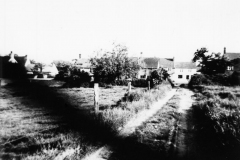 1970s. Track and fields on the north side of the road, now part of the Firs estate - looking south. There is still a short length of track near the road between No. 67 and No. 69.