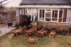 c. 1980 16 Enstone Road. Ken and Cicely Castle with model wagons made by Ken Castle.