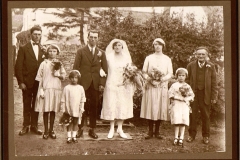 Marriage of Hilda Adams and Sid Cox. From left: Walter Cox (Sid's brother), Lily Adams (Hilda's niece), unknown bridesmaid, Sid, Hilda, Dorothy Cox (Sid's sister), unknown bridesmaid, Mr. Adams (bride's father).