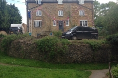 Scarecrows-putting-up-bunting-Mill-Lane