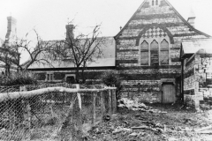 The fenced area on the left was the teacher's garden.