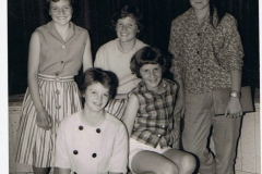 1962. Gillian Savage, from Middle Barton, (on the right), Steeple Aston School Fashion Show. Other girls unknown.
