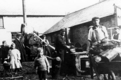 Early 1900s. Moses Castle, Jim Castle, William Brain and others at work on Westcote Barton Rectory. The Rev. R.S. Edwards (wearing boater) was the Rector.