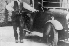 1920s Charles Boffin by his car outside the garage of 35 South Street.