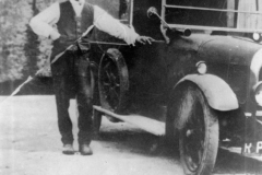 Charles Boffin and his car against the barn of ?