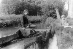 1925 Betty and Jean Dallinger at the waterfall where the lasher divided the water for the mill from the brook.