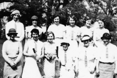 Back: ?, ?, ?, Elsie Cox, ?, ?. Front: ?, ?, ?, Joan Fleming, ?, ?.