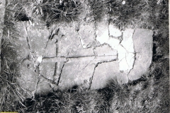 12th/13th centuries. Tomb slab near church porch. Originally uncovered in 1851 while digging foundations for extension to church.