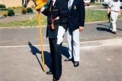 7 May V.E. Day Parade, Service and Presentation of commemorative coins. Nobby Clarke (with flag) and Dave Shirley.
