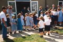 7 May V.E. Day commemoration. Derek and Deanne Gardner in doorway. Bob Adams right hand side in dark glasses.