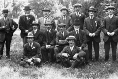 1920s at the Rectory. Back row: Percival Grimsley. William Brain, Phil Kirby, James Canty, George Hopes, William Holmes, George Stockford. Middle row: Jethro Callow, Samuel Clark, James Bassett. Front row: William Wheeler, George Brooks.