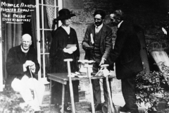 Middle Barton Flower Show. The prize distribution. L to R: Canon Carroll, Emma Stapleton, George Stockford, Charles Marsh.