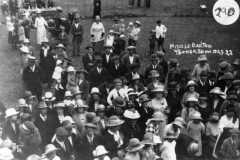 1923 Middle Barton Flower Show. Back: Joan Eaglestone as a child held by her mother, Doris Baker as a girl, her mother and her sister, Peggy, in a pram, Aunt Mabel standing by the pram.