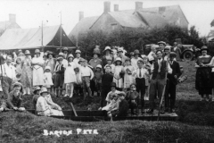c. 1930 Chapel fete. Mill stream in field on north side of South Street. 16 and 18 South Street in the background.