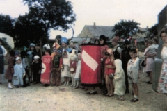 1960s Preparing for the Fancy Dress competition at the Barton Abbey fete. The children were taken from the Fox on a trailer pulled by a tractor.
