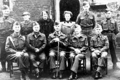 WW II l -> r back row: ?, ?, Katherine Morris, Joan Sullivan, ?, Whetton. Front row: ?Dunbar Kilburn, Tom Moulsdale, Jack Morris, Dr. Hodges, Frank Henderson.