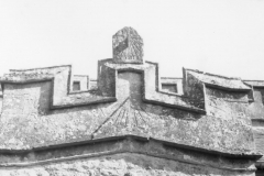The sun dial on the gable of the 15th century porch and the smaller sundial above it which has been reset.