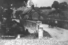 Around 1930. Enstone Road bridge. Thought to be Ivy Shrimpton with John Anthony (son of Dorothy L. Sayers) and Isobel. Showing Burnside and Hennock House.