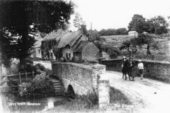 Around 1930. Enstone Road bridge. Thought to be Ivy Shrimpton with John Anthony (son of Dorothy L. Sayers) and Isobel. Showing Burnside and Hennock House.