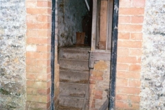 December 1985 Door in building south side of drive of Manor Farm. Door date 1775.